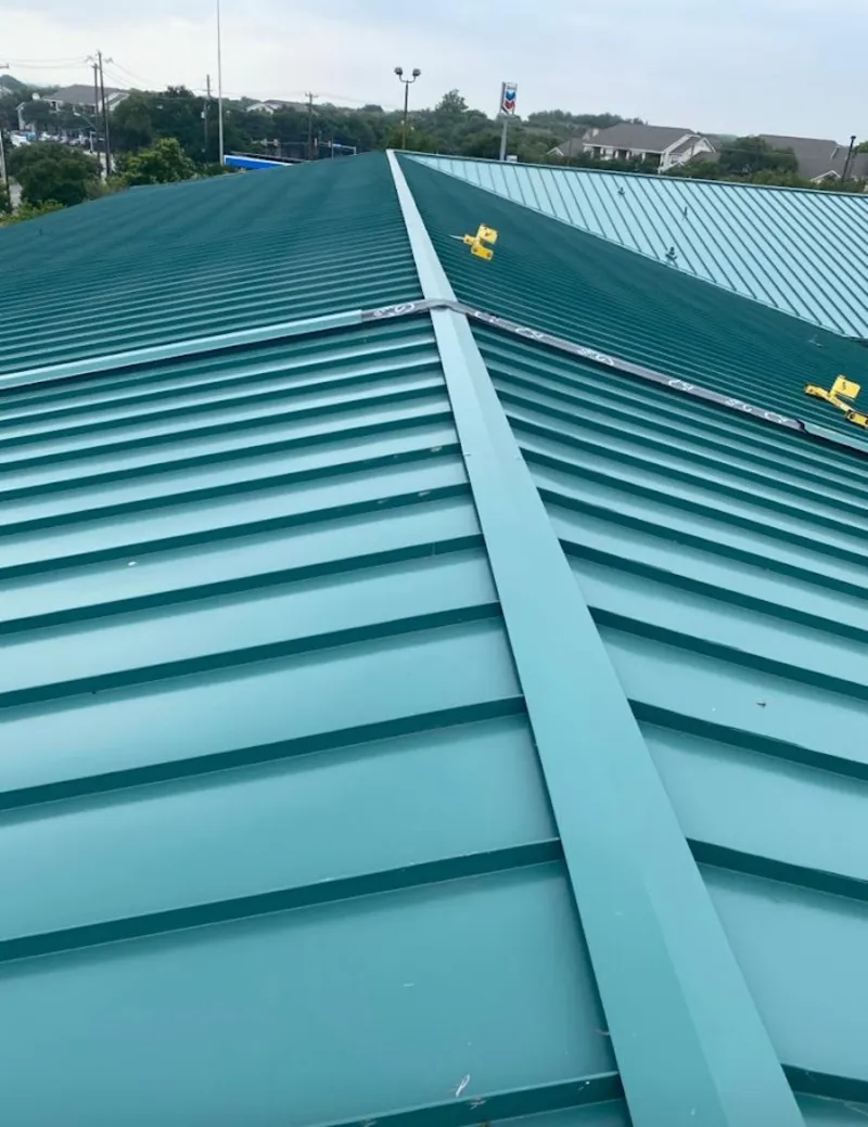 Green commercial metal roof ridge and valley for Metal Roof Repair in Greenbriar