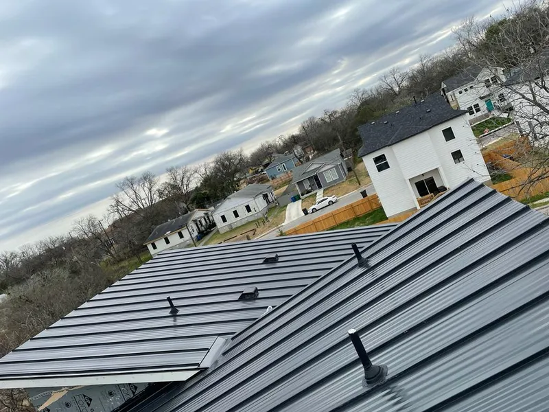 Standing seam metal roof panels with vents for Skylight Repair in Greenbriar